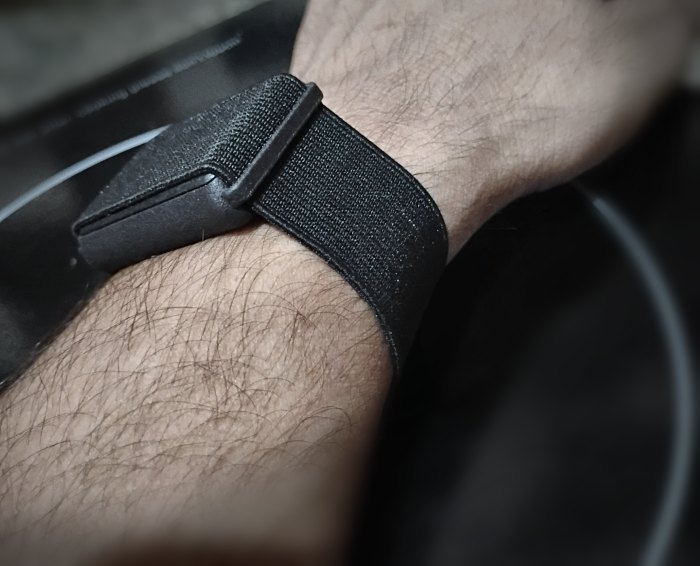 BitwellBand 1 with a black strap, on the wrist