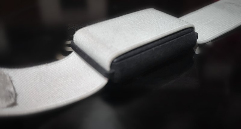 BitwellBand 1 with a white strap running over the band
